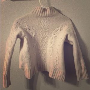 White turtle neck sweater